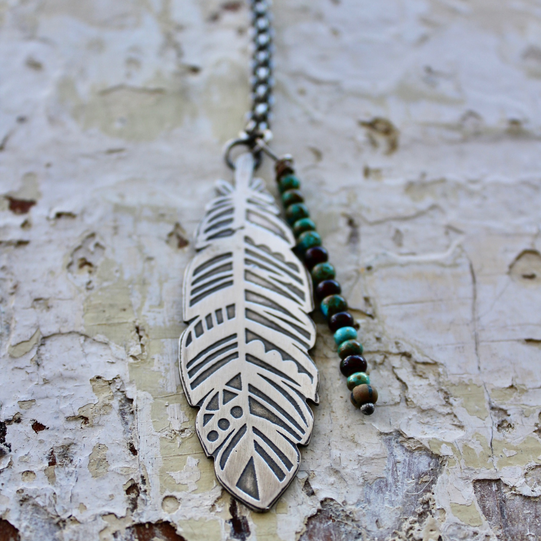 Long silver feather necklace deals